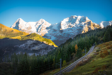 Mountains Eiger, Mönch and Jungfrau in the Bernese Oberland region of the Swiss Alps 