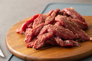 Raw meat on a cutting board