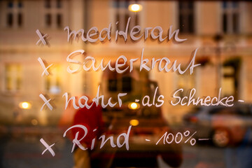 Fotograf im Schaufenster