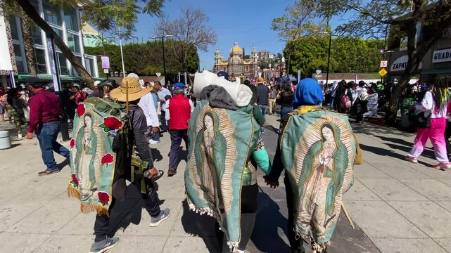 Pilgrims visit the sacred Basilica Virgin of Guadalupe during a sunny weekend in Mexico City, Mexico.