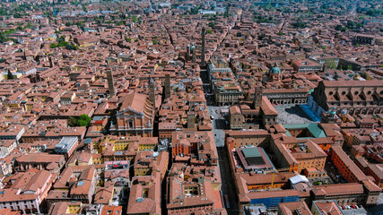 A breathtaking aerial view of Bologna’s historic heart featuring Piazza Maggiore, the Two Towers, and stunning medieval architecture, showcasing the charm of Italy’s cultural heritage.