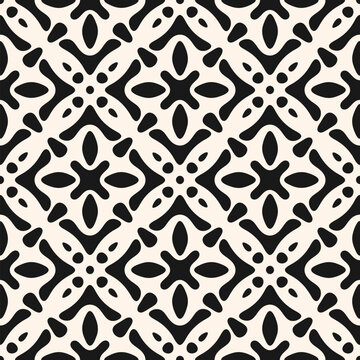 Fototapeta Abstract black and white vector seamless pattern. Simple floral geometric ornament with ethnic folk motif. Retro vintage background. Monochrome texture with flower silhouettes, organic shapes, tiles