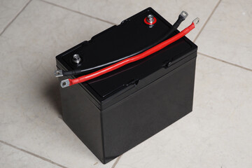 Black Lithium Battery with Black and Red Copper Battery Inverter Cable.