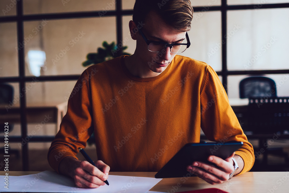 Aufkleber creative male student spending time for course work during making research for college project via m
