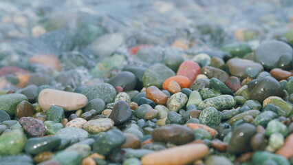 Colorful Sea Stones In Water. Stones Under Water. Nautical Background. Pebbles On The Beach. Still.
