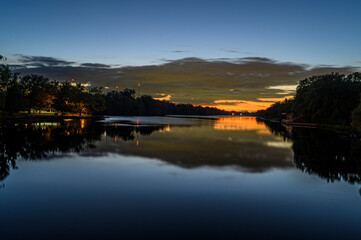 Calm reflective river water during sunset from Toronto Center Island Bridge at Ontario lake, reflective 