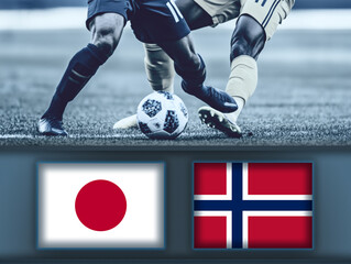 Japan and Norway flag on scoreboard,against football players during a match on soccer field.