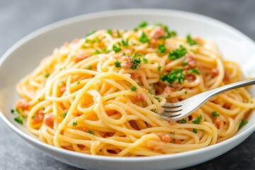 Fork Twirling Spaghetti with Basil Garnish and Grated Parmesan on a Plate
