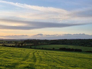 Clouds in the Dusk Sky Over Highland Agriculture