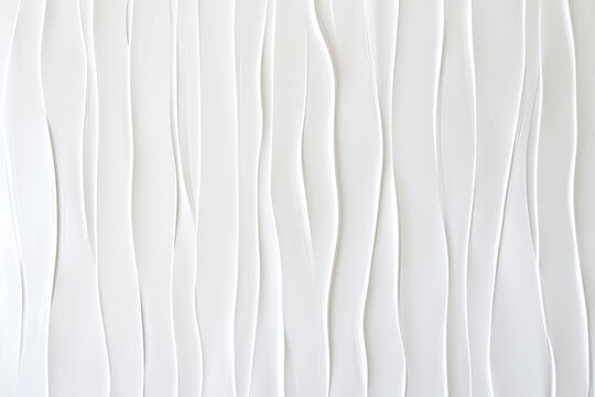Minimalist white wall with vertical wave pattern, creating serene and modern atmosphere. Ideal for contemporary interior design and artistic spaces