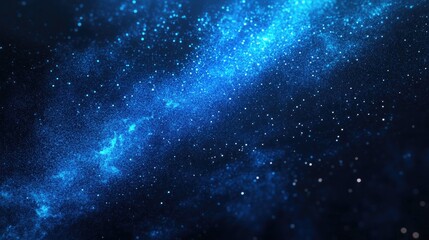 Obraz premium A mesmerizing galaxy scene showcasing vibrant blue hues and shimmering stars in a vast cosmic expanse.