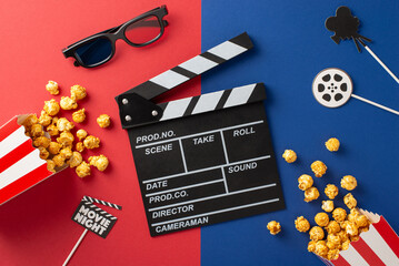 A creative flat lay featuring a clapperboard, popcorn, 3D glasses, and a movie reel on a vibrant colored background, perfect for a movie night theme