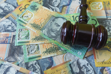 justice gavel with australian aud money. Juridical concept