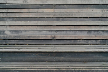 Wooden panel wall with horizontal planks, showcasing rustic design and natural texture. Perfect for backgrounds or interior decor