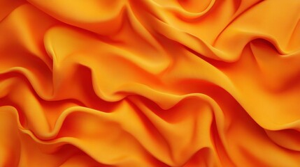 Obraz premium Vibrant orange fabric with soft, flowing folds creating an abstract texture.