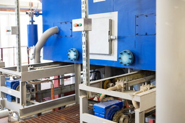 Modern industrial steam boiler room equiped for heating process.