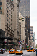 Yellow Taxis on Bustling New York City Street Scene