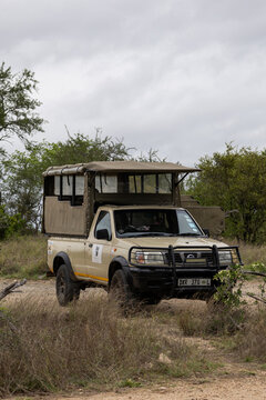 Kruger national park, Specialized open safari vehicle OSV, Nissan NP300 car. Special transport for traveling through the savannah and observing wild animals. South Africa - 29 Oct 2023