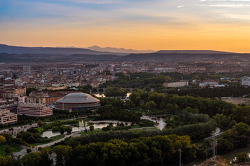 View of the city at sunset from the top of the hill