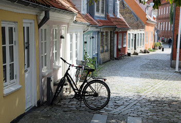 Cobblestone Alley With Parked Bicycle