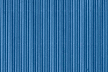Abstract background of blue ridges, textured striped pattern