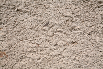 beige plaster wall, antique wall texture, rustic plaster, aged surface, historic wall, vintage stucco, weathered plaster, textured wall, old-world charm, architectural detail, natural tones, cracked p