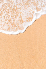 Tropical beach background with soft wave and white sand