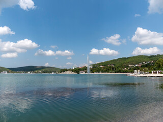 Abrau Durso, Russia 28 August 2024: Picturesque view of embankment of lake Abrau on sunny day in Abrau Durso