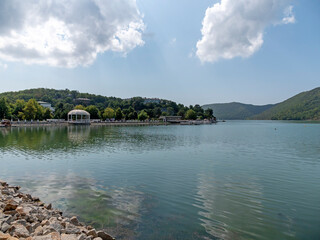 Abrau Durso, Russia 28 August 2024: Picturesque view of embankment of lake Abrau on sunny day in Abrau Durso