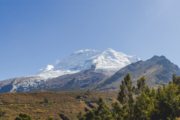 View of the snow-capped mountains of the Cordillera Blanca, located on the road between the provinces of Carhuaz and Asuncion, near Punta Olimpica. Ancash, Peru.