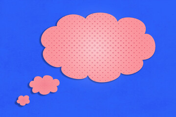Pink clouds in comic strip on blue background. Women's desires concept for communication, sales and shopping. Speech bubbles or thought balloons.