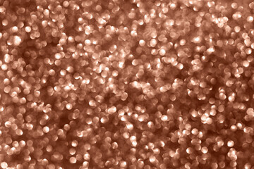 Mocha brown sequins background. Perfect texture for your design. Demonstrating color of 2025 year