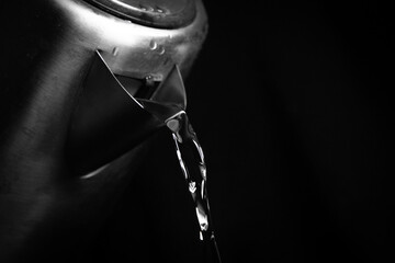 Water pouring from kettle