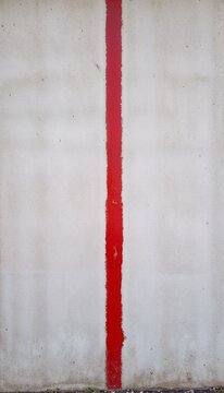 Minimalist Street Art Background with One Bold Red Line, Sharp Contrast Against a Smooth White Wall