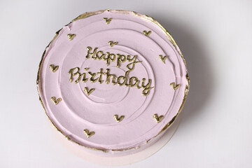Pink cake with the inscription 