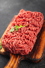 minced meat fresh beef, pork meat tasty eating cooking meal food snack on the table copy space food background rustic top view
