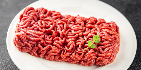 minced meat fresh beef, pork meat tasty eating cooking meal food snack on the table copy space food background rustic top view