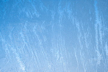Frosty patterns on the glass. Frost on the glass.