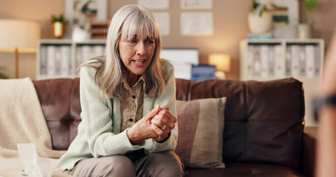 Consultation, therapist and woman with talking for anxiety, session and recovery support for mental health. Therapy, psychologist and senior patient in counseling for share trauma, progress or stress