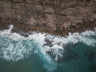 Aerial View, TopDown Photo of Sea Coast with Sea and Rocks Textures