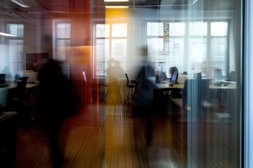 Motion blur background of workers in modern office.