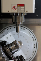 close up of CNC machining center with rotary table