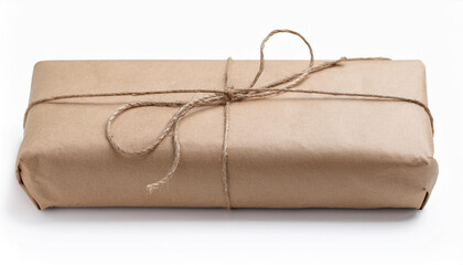 Package wrapped in craft brown paper with brown jute rope, isolated on white backdrop.