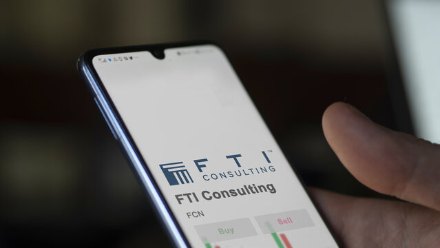 March 26th 2024, logo of FTI Consulting on a white wall in a hall building, the $FCN brand indoor.