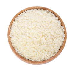 Raw rice in wooden bowl isolated on white, top view