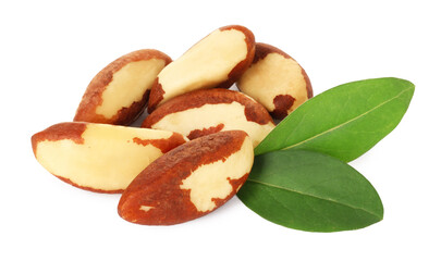 Tasty Brazil nuts with green leaves isolated on white