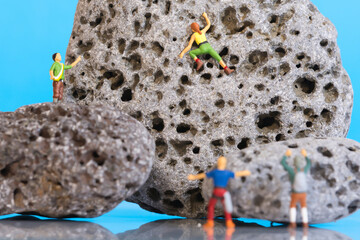 Climbers, mountaineers in action, miniature figures scene