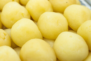 Rasgulla or Rosogolla texture closeup side view of Indian, pakistani and bangladeshi sweet dessert food