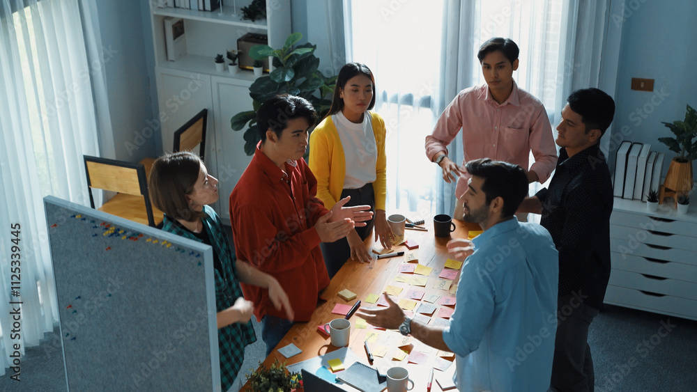 Poster top view of smart business team writing marketing idea on colorful sticky notes while start up team 