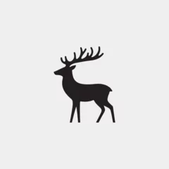 Selbstklebende Fototapeten Minimalist deer silhouette logo design  © nandod21